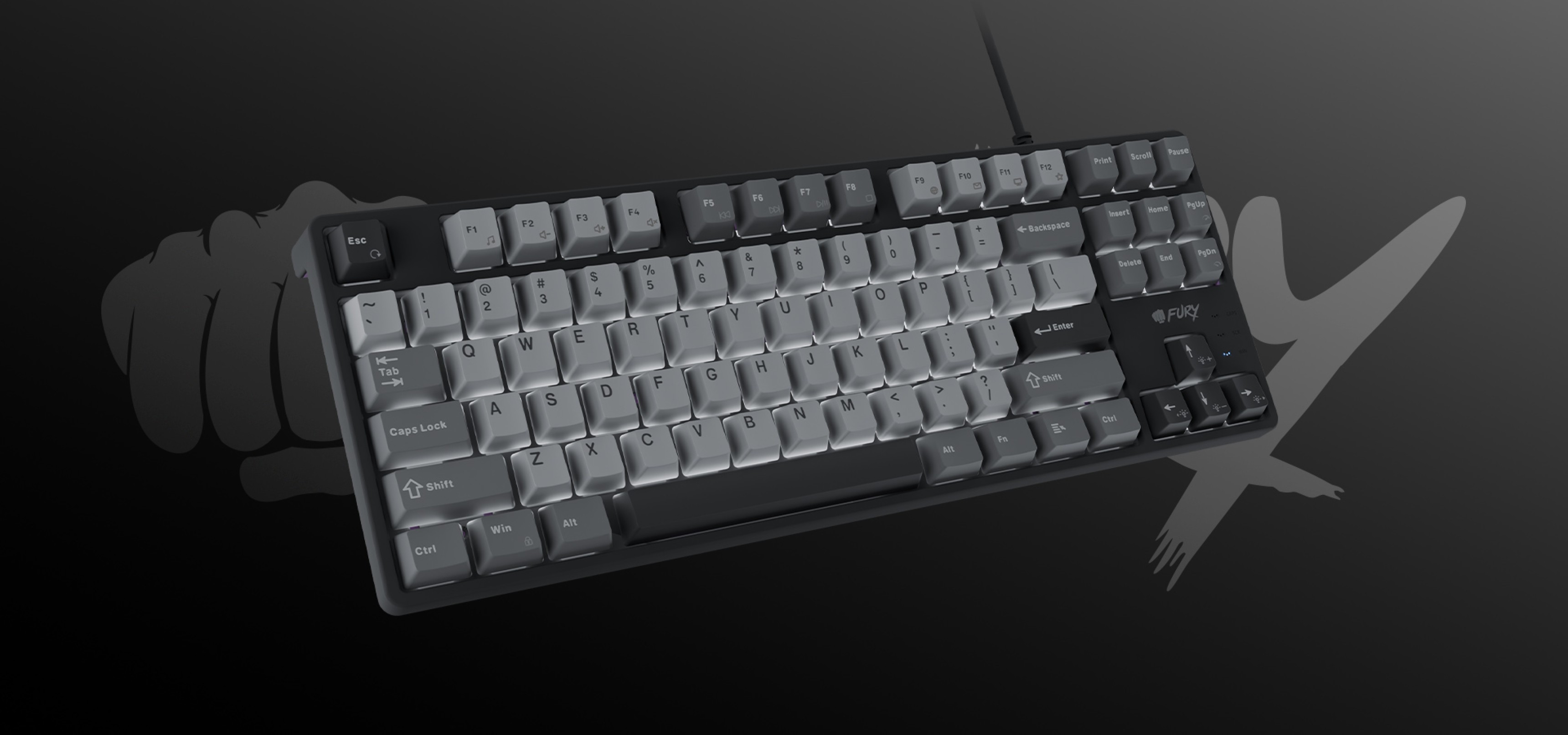 Computer keyboard with a mix of gray and black keys on a dark background.
