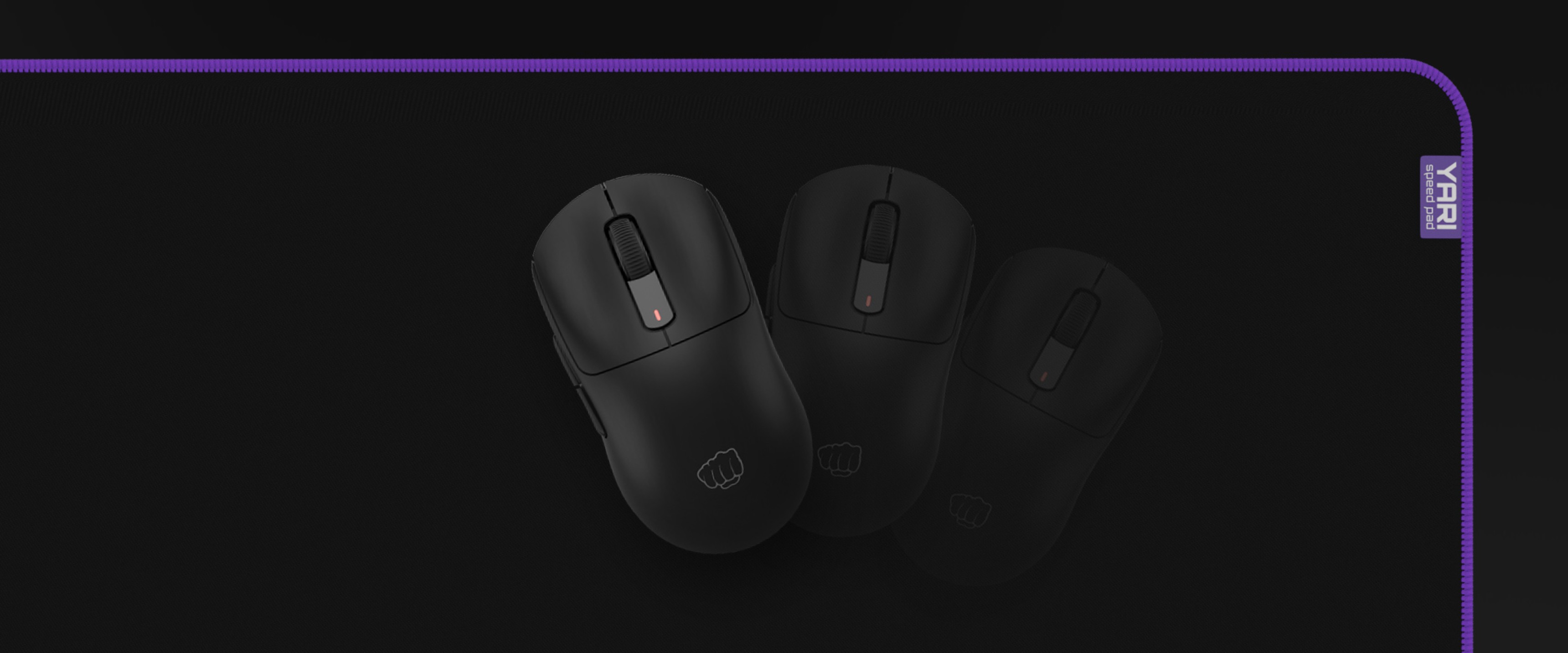 Black gaming mouse pad featuring the Fury Yari Speed logo and three black mice positioned on it. Dimensions: 1200x600mm