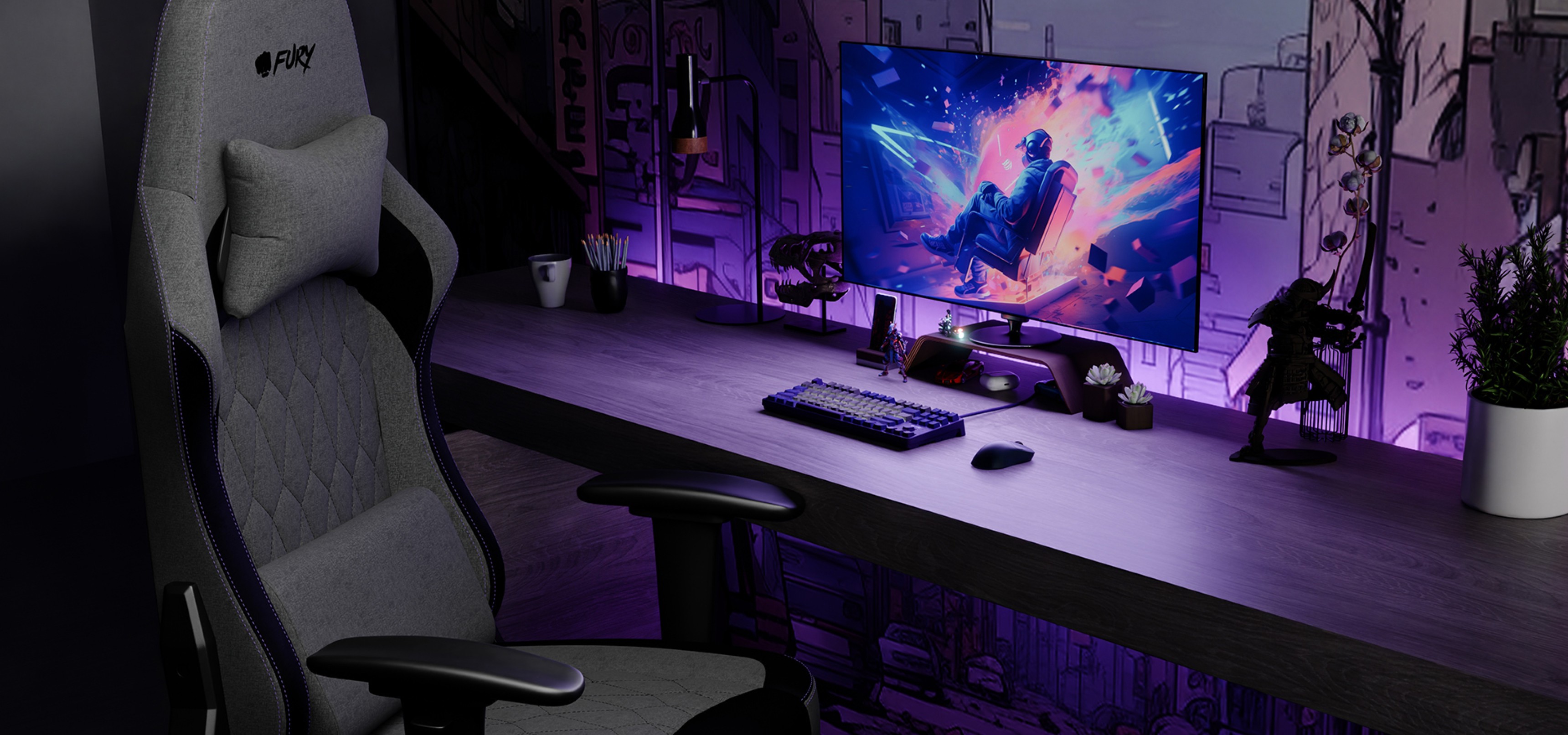 Gray gaming chair positioned at a desk with a computer, keyboard, and vibrant monitor display