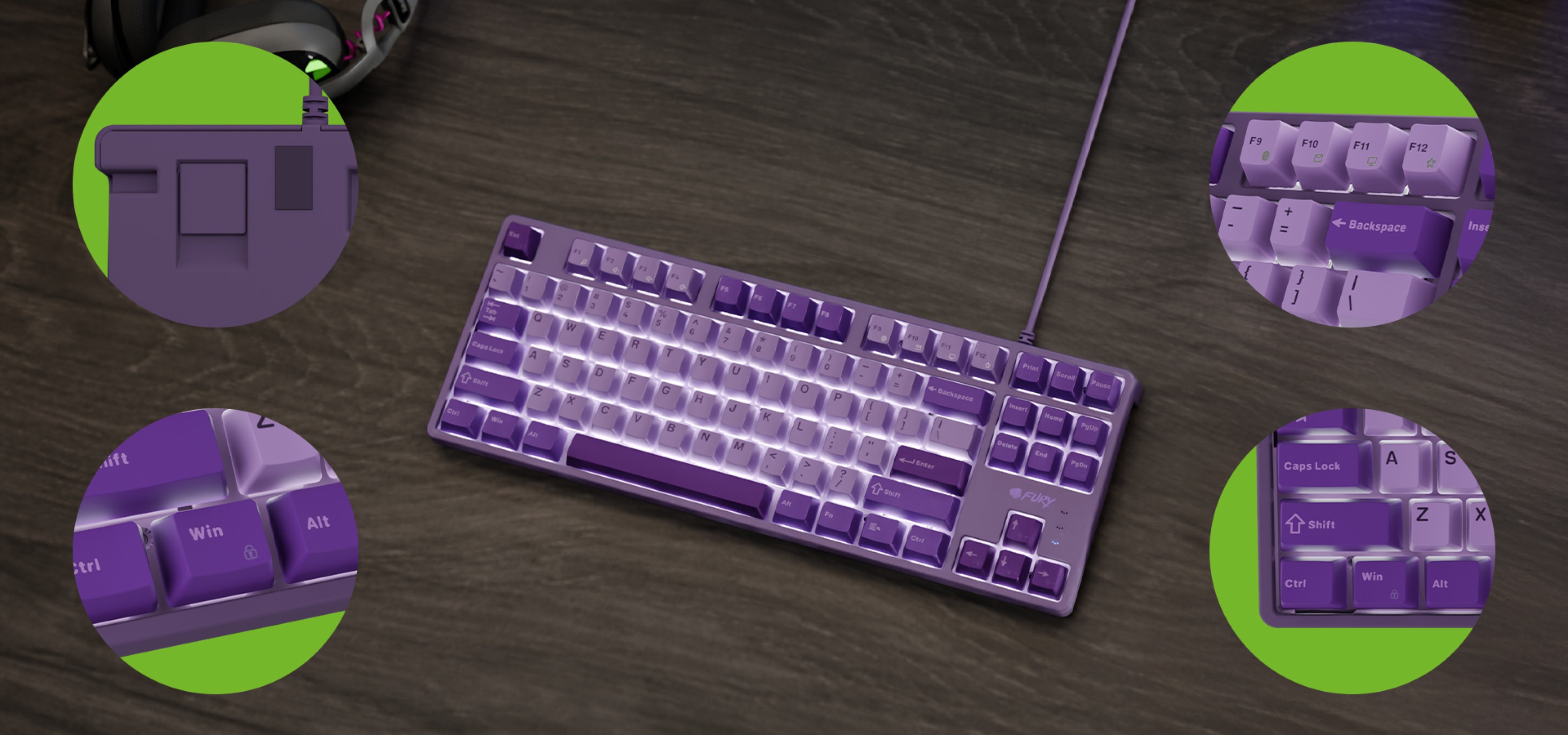 Purple keyboard with various key designs and a connection cable displayed on a wooden surface.
