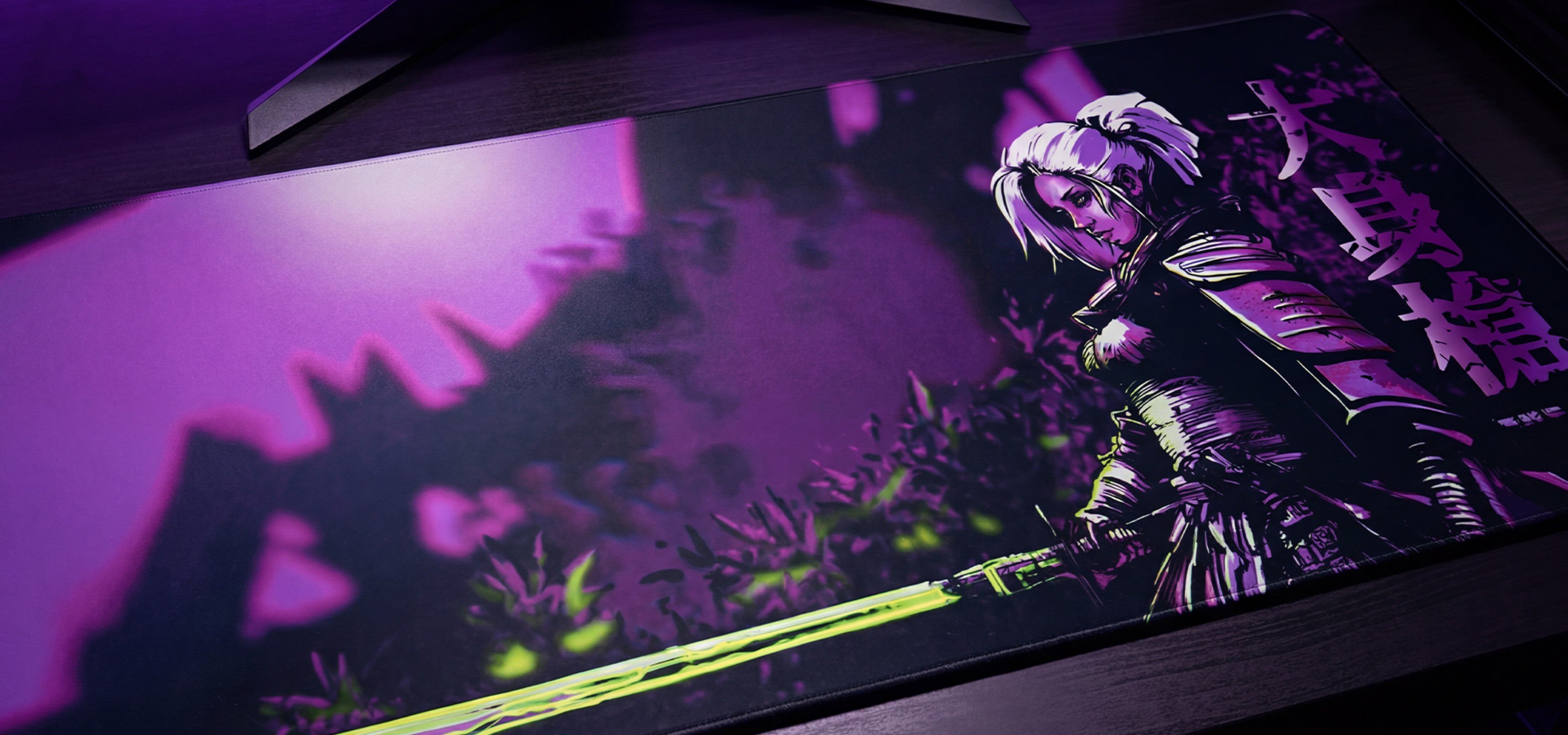 A large gaming mouse pad featuring a character with a sword in a purple and black design.