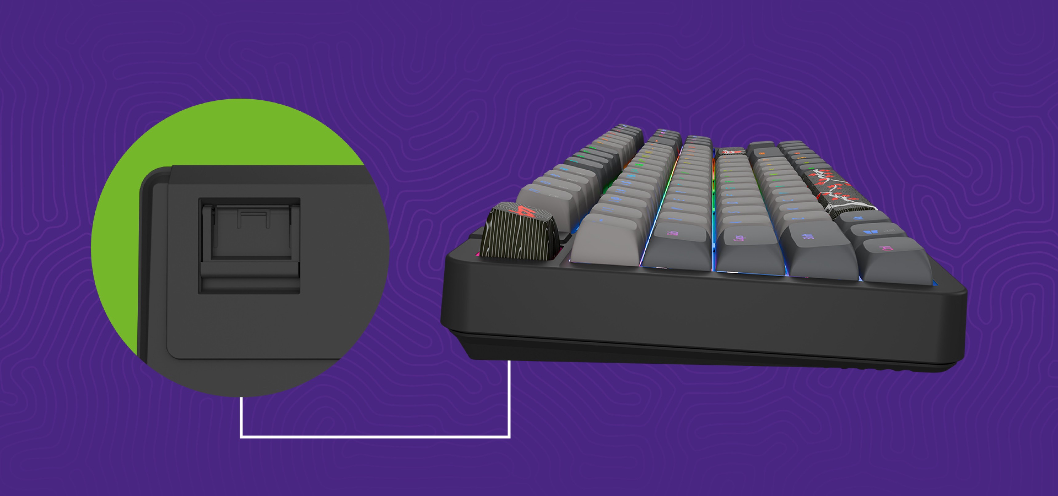 A keyboard showing a side view with a close-up of a button on the side.